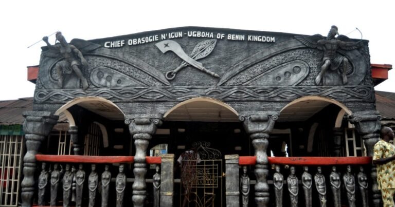 A carved Benin chieftaincy gate in Benin City, Edo State