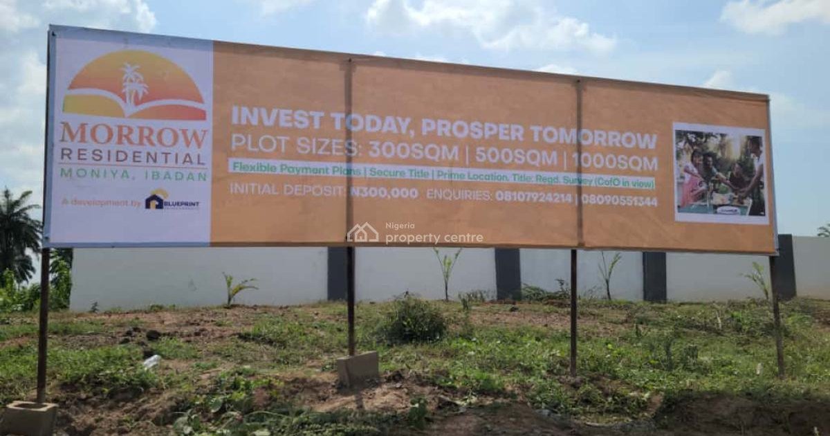 A residential land estate billboard advertising plots in Nigeria